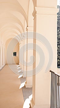 Arcs sequence of a covered corridor called Corte d`Onore photo
