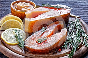 Arctic char and cod roe on a wooden background