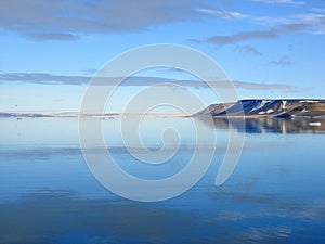 Arctic Island, sky and sea photo
