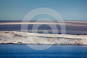 Arctic Islands Glaciers, snowfields, iceberg and rock outcrops