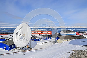 Arctic station covered in snow and Nuuk city fjord view, Greenland