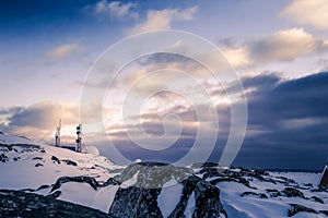 Arctic telecommunication station among snow rocks, Nuuk, Greenland