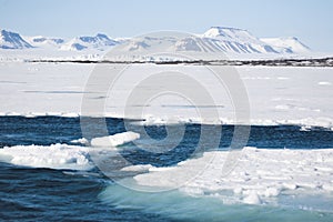 Arctic winter landscape - sea, glacier, mountains