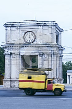 Arcul de triumf victory arch with an old car, chisinau, moldova photo