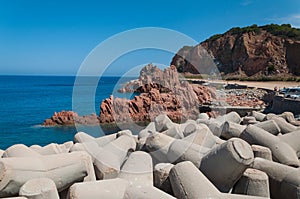 Ardinia Coastline: Typical Red Rocks and Cliffs near Sea in Arbatax; Italy at summer