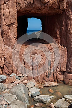 Ardinia Coastline: Typical Red Rocks and Cliffs near Sea in Arbatax; Italy at summer