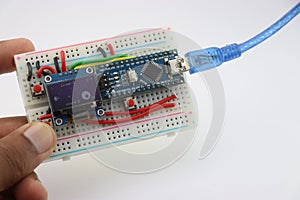 Arduino mini game prototype project made from OLED display and programmable controller on Breadboard