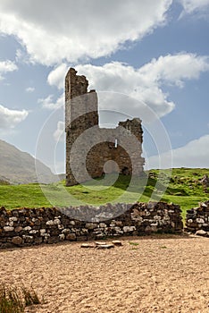 Ardvreck Castle, a testament to Scotland\'s medieval past, set against its stark, captivating landscape