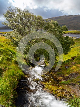 Ardvreck Castle Waterfall, Loch Assynt in Sutherland, Scotland