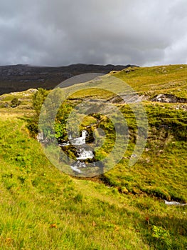 Ardvreck Castle Waterfall, Loch Assynt in Sutherland, Scotland