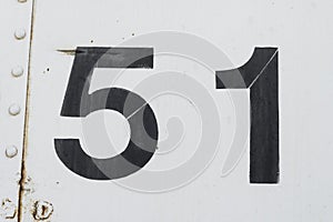 Area 51 number 51 fifty one white old metal background texture photo