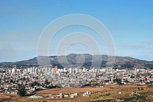 AREA VIEW OF THE CITY OF TANDIL IN A VALLEY WITH LOW MOUNTAINS WITH BUILDINGS IN PROVINCE OF BUENOS AIRES ARGENTINA-OCT 2018