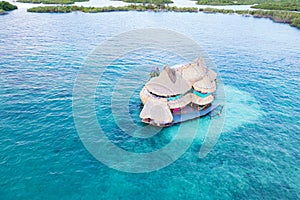 Area view of a house floating in the Colombian Caribbean Sea