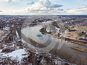 Areal drone photography view of small countryside city Kuldiga, with river Venta