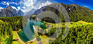 Areal view of Arnisee with Swiss Alps. Arnisee is a reservoir in the Canton of Uri, Switzerland, Europe