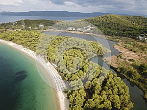 Areal view of famous Koukounaries beach at Skiathos lake and pine forest