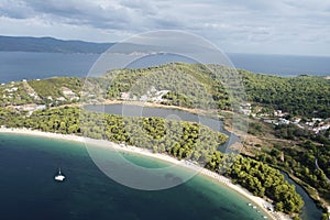 Areal view of Koukounaries beach at Skiathos lake and pine forest