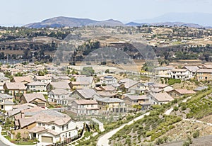 Areal View of Neighborhood and Majestic Clouds