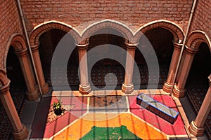 An areal view of ornamental courtyard with sunlight in the palace of bangalore.