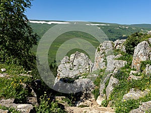 Areas of mountainous terrain in hot summer, walking along the canyon on a sunny day, communicating with nature,wild places.