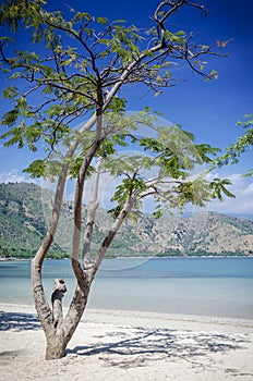 Areia branca tropical beach view near dili in east timor photo