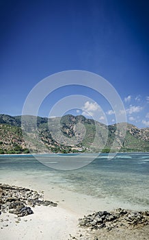 Areia branca tropical beach view near dili in east timor photo