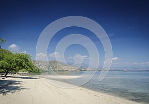 Areia branca tropical beach view near dili in east timor photo