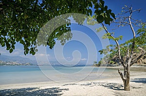 Areia branca tropical beach view near dili in east timor photo