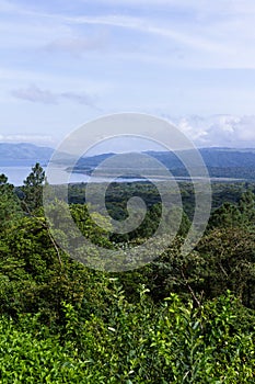 Arenal lake and rainforest photo