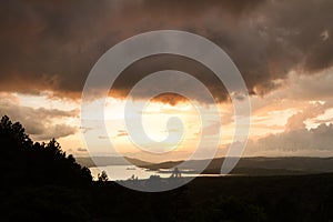 Arenal lake reflection the sun photo