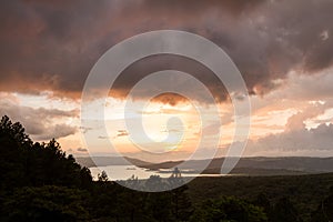 Arenal lake reflection the sun photo