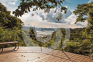 Arenal Volcano National Park viewer with Arenal Lake and nature in background in a sunset photo