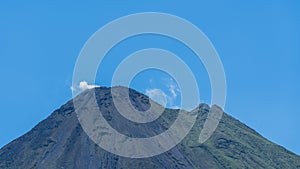 Arenal Volcano, which has an almost perfect cone shape, is one of the biggest tourist attraction in Alajuela, Costa Rica