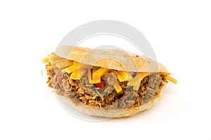 Arepa with shredded beef and cheese isolated. Venezuelan typical food