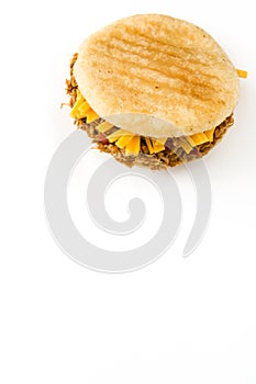 Arepa with shredded beef and cheese isolated. Venezuelan typical food