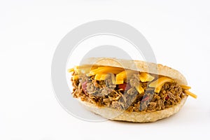 Arepa with shredded beef and cheese isolated. Venezuelan typical food photo