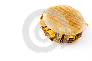 Arepa with shredded beef and cheese isolated on white background. Venezuelan typical food