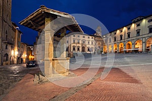 Arezzo, Italy. Piazza Grande and old well