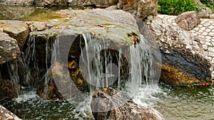 Arfificial Water Cascade In Garden.