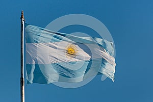 Argentina flag flying on flagpole