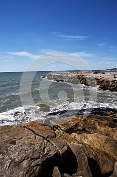 ARGENTINA-MAR DEL PLATA tourist city of modern buildings with the beach with tourists and the Atlantic Ocean