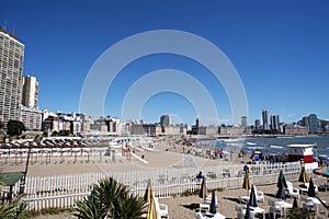 ARGENTINA-MAR DEL PLATA tourist city of modern buildings with the beach with tourists and the Atlantic Ocean