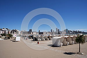 ARGENTINA-MAR DEL PLATA tourist city of modern buildings with the beach with tourists and the Atlantic Ocean