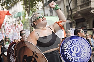 Argentina, women`s day 2020. Young woman defending the Church / State separation