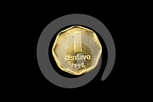 Argentine Gold One Centavo Coin Isolated On Black photo