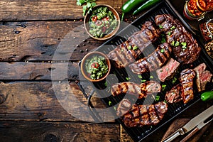 Argentine Parrilla with Grilled Meats and Chimichurri Sauce photo