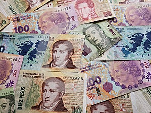argentinean banknotes of different denominations, background and texture photo