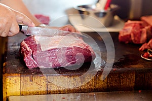 Argentinean raw beef steak meat is cut, sliced