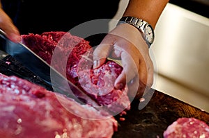 Argentinean raw beef steak meat is cut, sliced