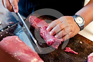 Argentinean raw beef steak meat is cut, sliced